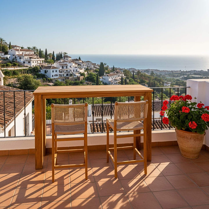 Outdoor terrace setting featuring the Maldives bar table