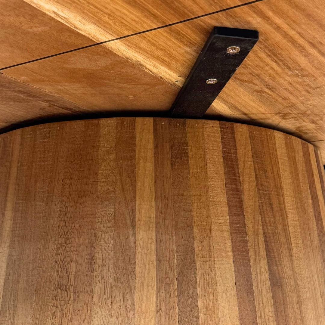 Underside detail of the Maldives round table showing the conical structure and mounting bracket.