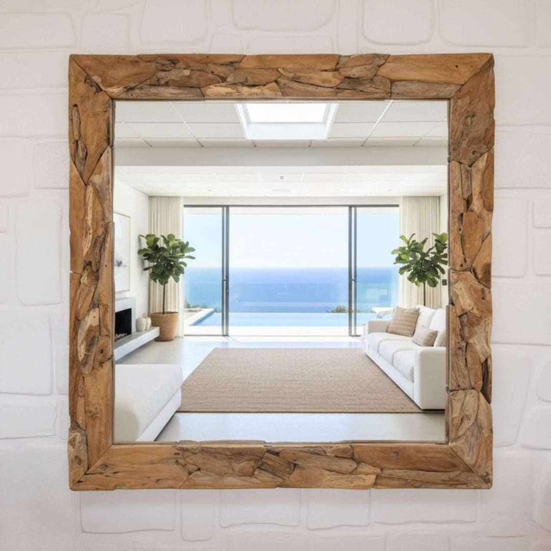 Full interior view with the large Male Square Mirror reflecting a bright living room.