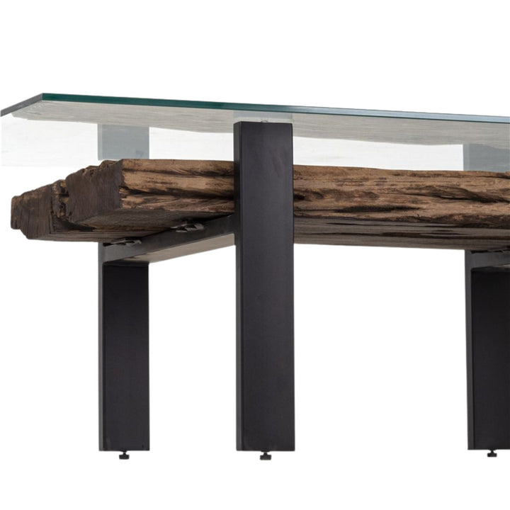 Close-up detail of the reclaimed wood texture visible beneath the glass top.