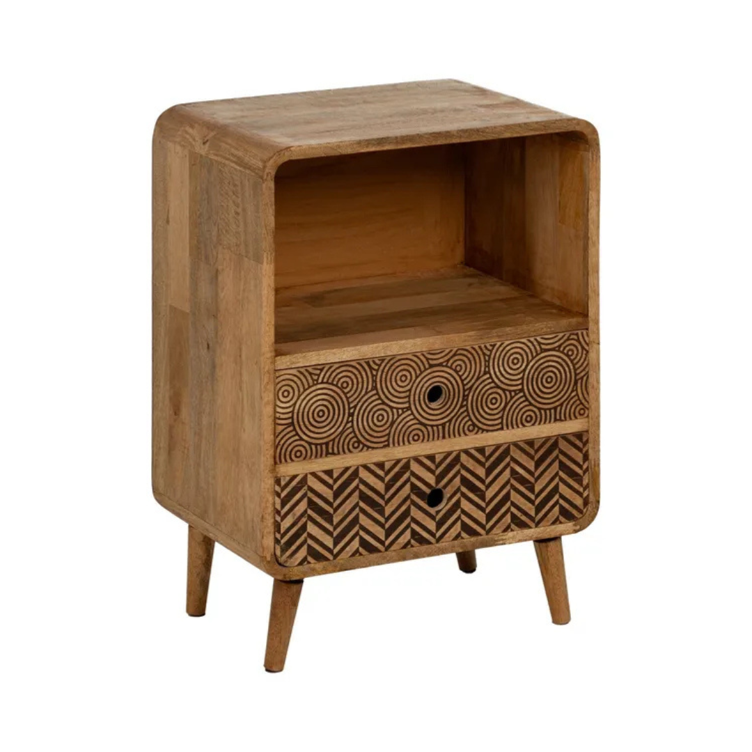 Front view of the Maluku bedside table made from mango wood with carved drawer fronts.