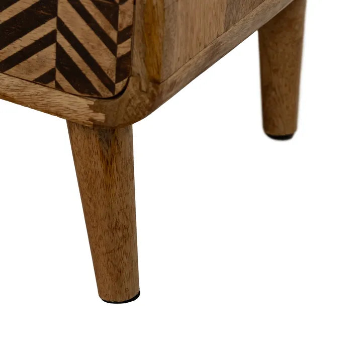 Detail of the wooden legs and solid construction of the Maluku bedside table.