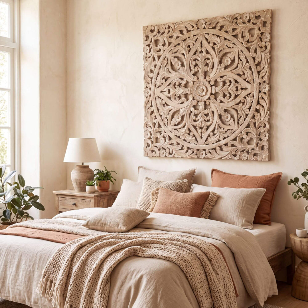 Mandala carved wood wall panel displayed above a bed in a warm Mediterranean-inspired bedroom