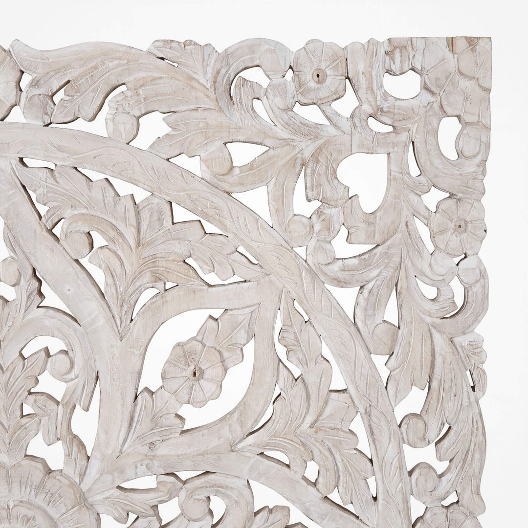 Close-up of the Mandala wall decoration highlighting the detailed floral carving and weathered reclaimed wood texture