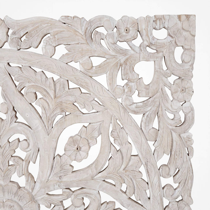 Close-up of the Mandala wall decoration highlighting the detailed floral carving and weathered reclaimed wood texture