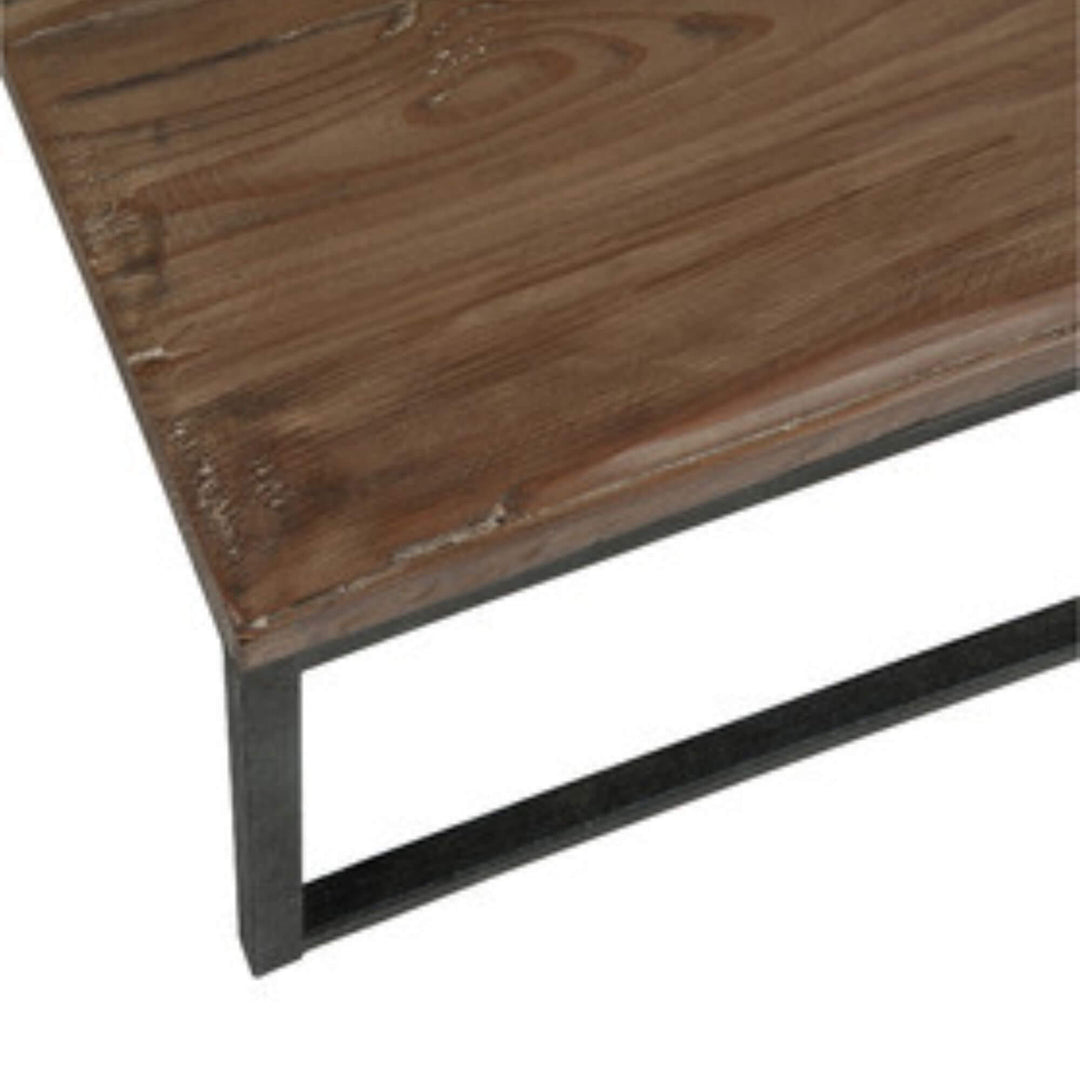 Close-up of the mango wood grain on the coffee table surface.