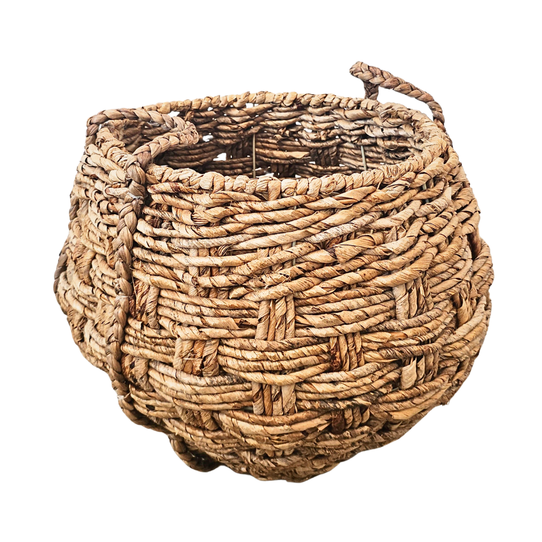 Angled view showing deep rounded shape and woven texture