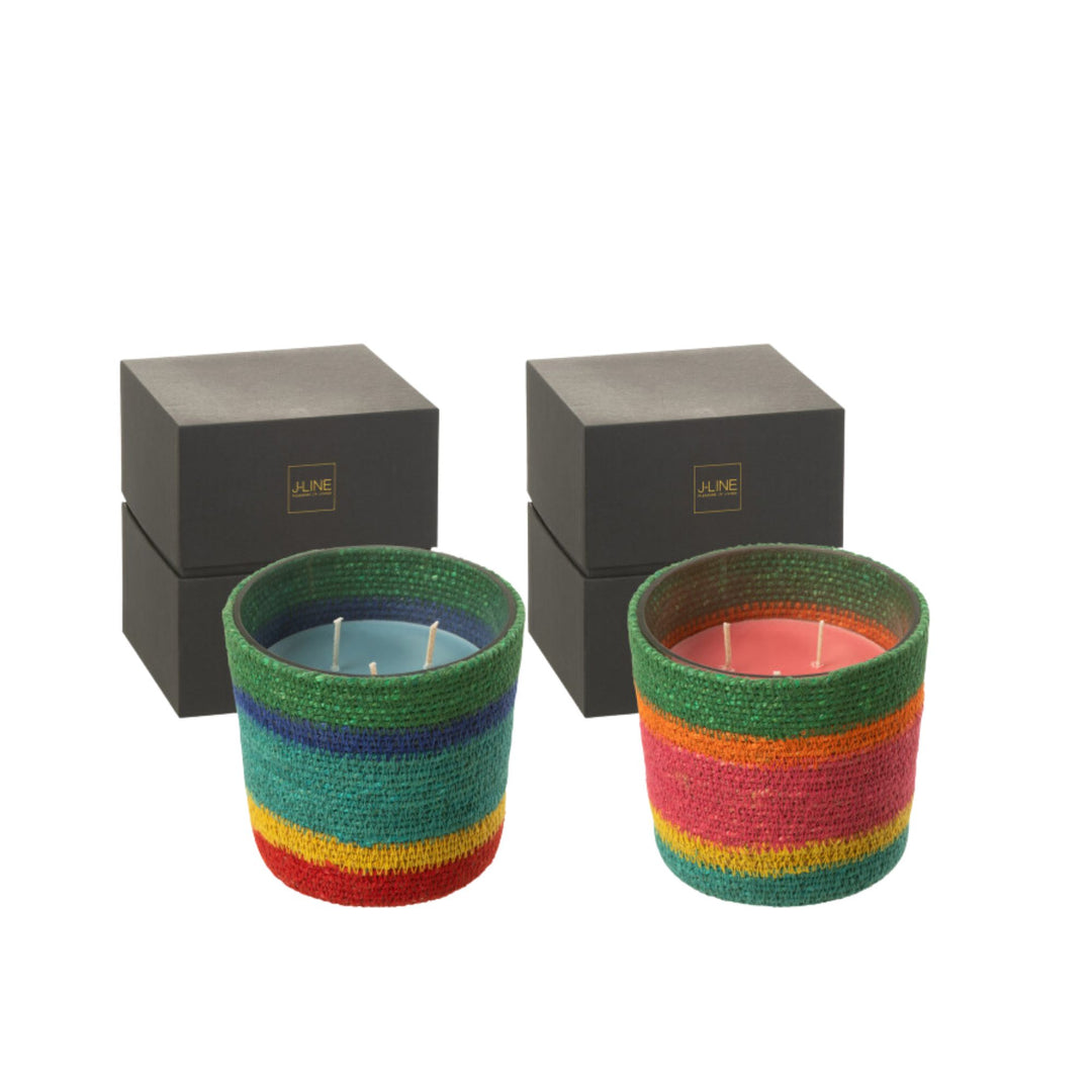 Two Marion Candles with gift boxes, showcasing colorful striped natural fiber wrapping.