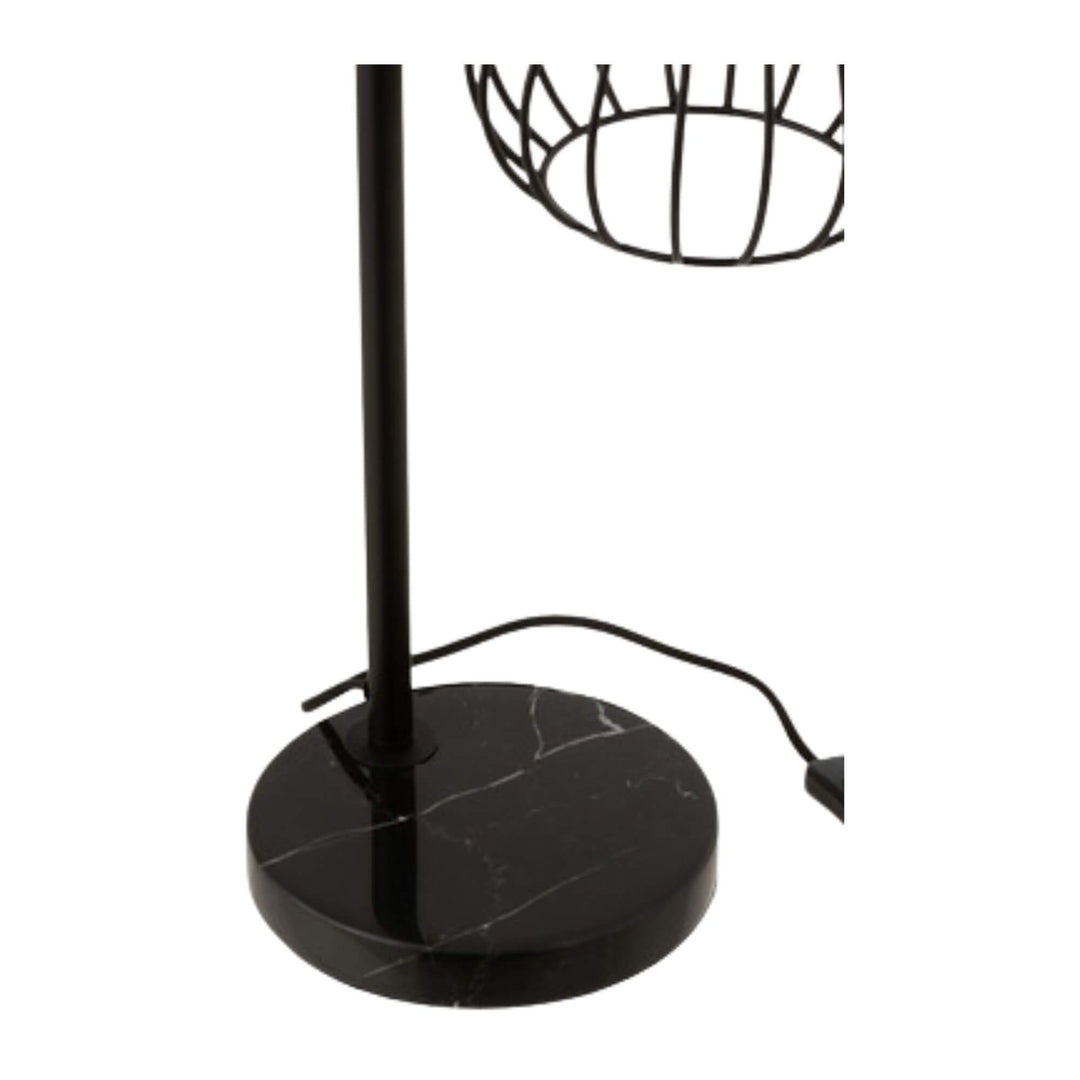 Side view of Marma lamp highlighting its marble base and slim steel design.