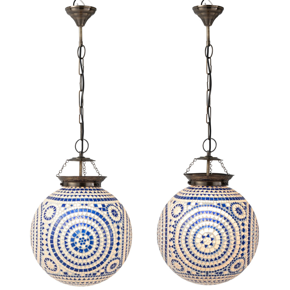 Lit pair of large Marrakesh mosaic pendant lamps hanging side by side.
