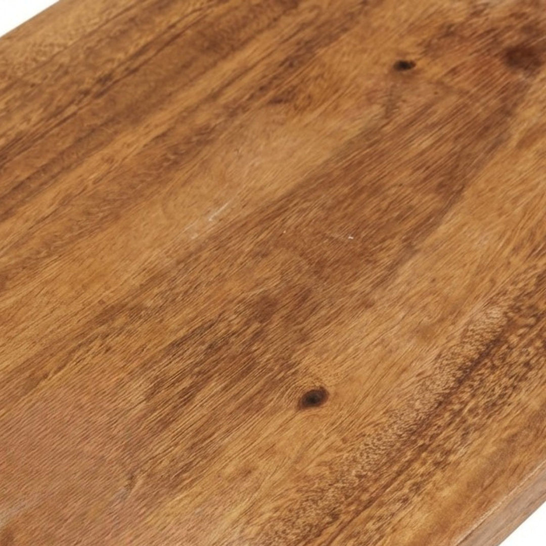 Close-up detail of the suar wood surface emphasizing natural grain and warm tones.