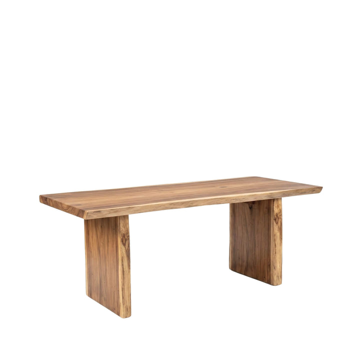 Maui Suar Wood dining table with black wooden legs on a white background