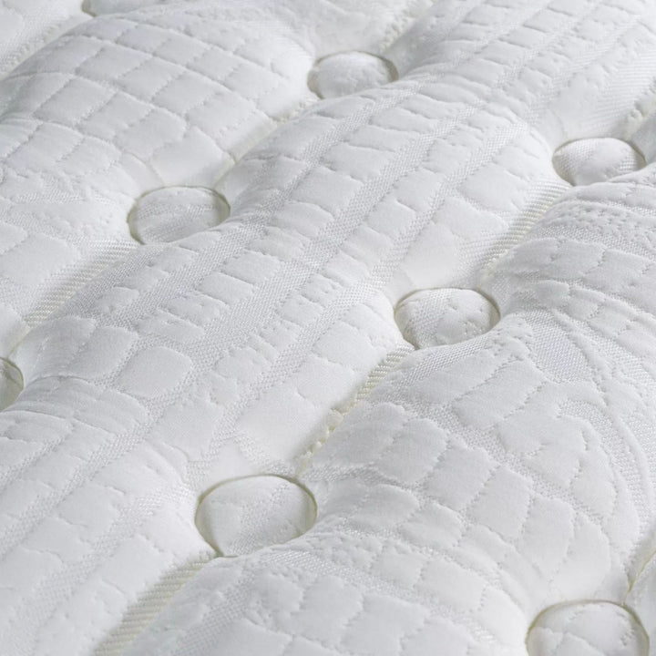 Close-up of the quilted surface emphasizing texture and comfort zones.
