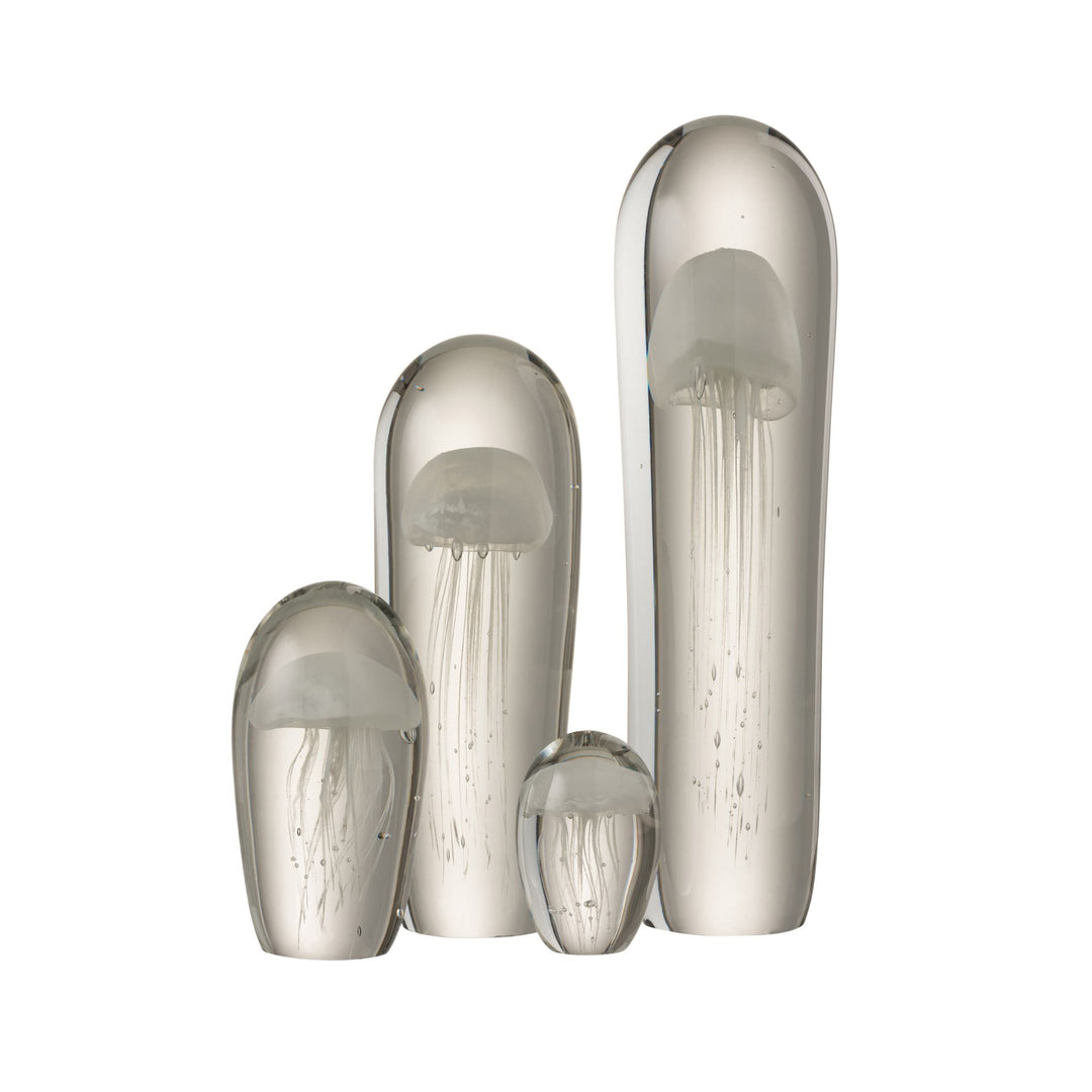 Group display of Medusa Glass Bright sculptures in different sizes.