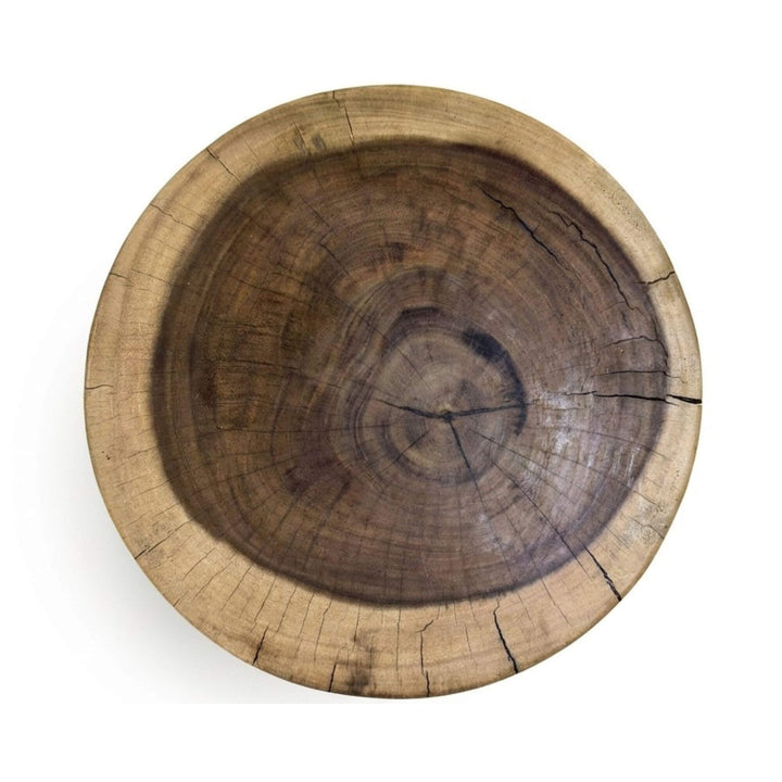 Close-up detail of the smooth hand-carved finish and organic wood texture.