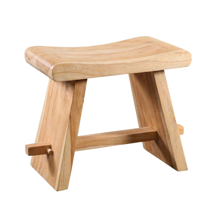 Midas suar stool showcasing its sculpted seat and natural wood grain.