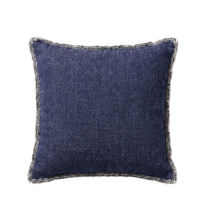 Front view of the Midnight Blue fringed cushion showing its textured woven fabric and soft fringe edging.