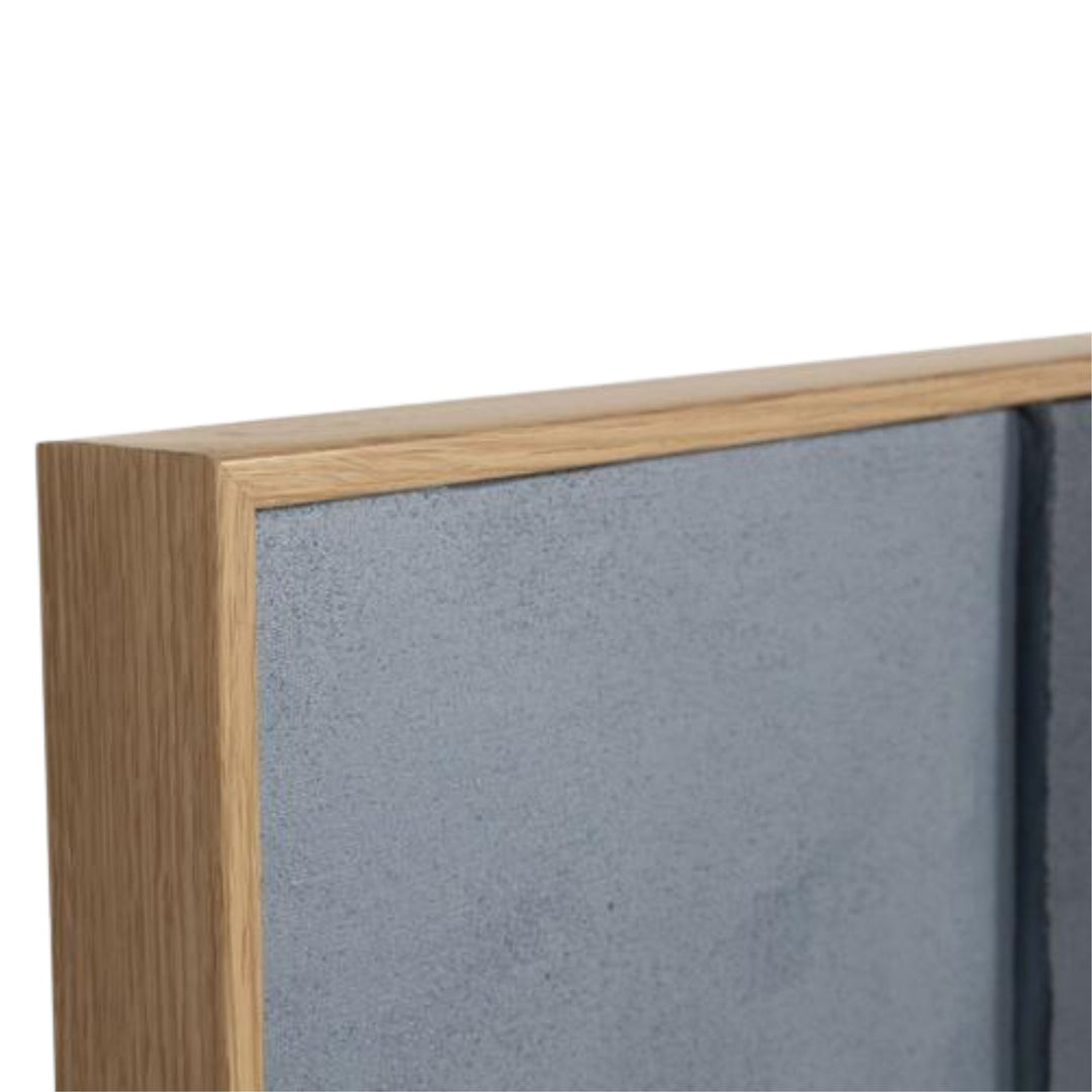 Close-up detail of the pine wood frame and painted canvas texture.