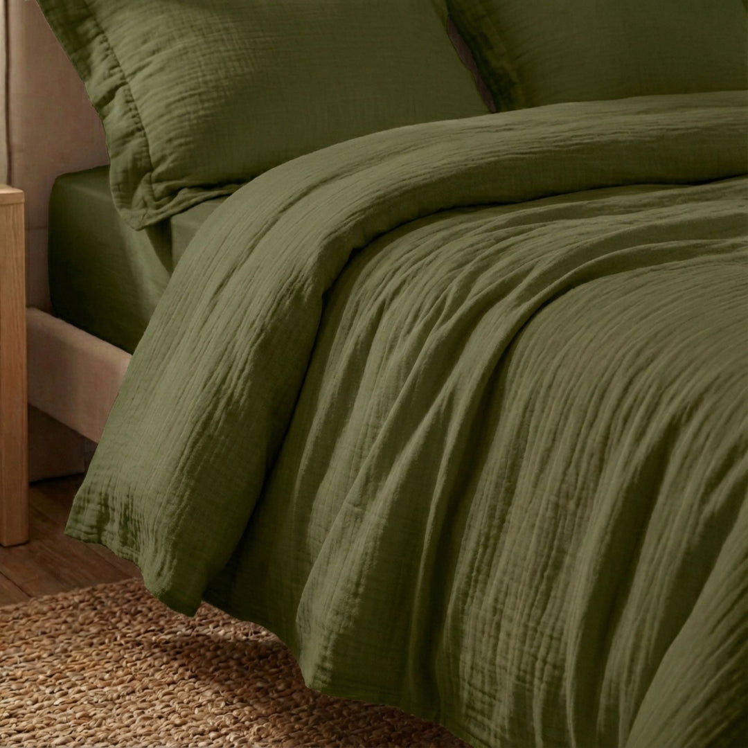 Close-up view of the Milos duvet cover highlighting its muslin cotton texture and soft drape.