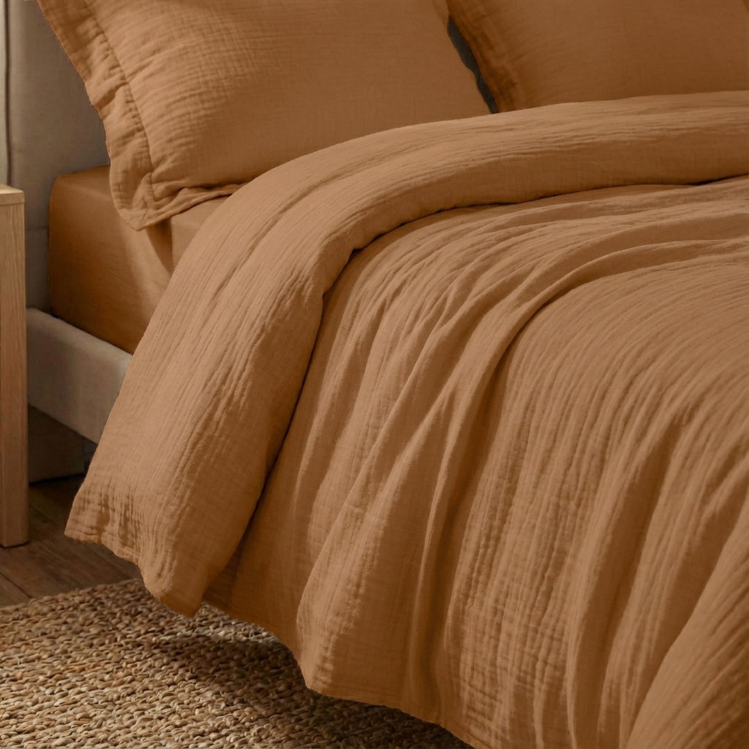 Close-up view of the Milos duvet cover highlighting its muslin cotton texture and soft drape.