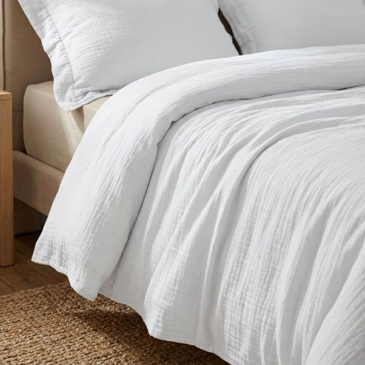 Close-up view of the Milos duvet cover highlighting its muslin cotton texture and soft drape.