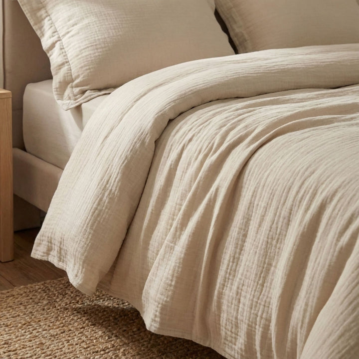 Close-up view of the Milos duvet cover highlighting its muslin cotton texture and soft drape.