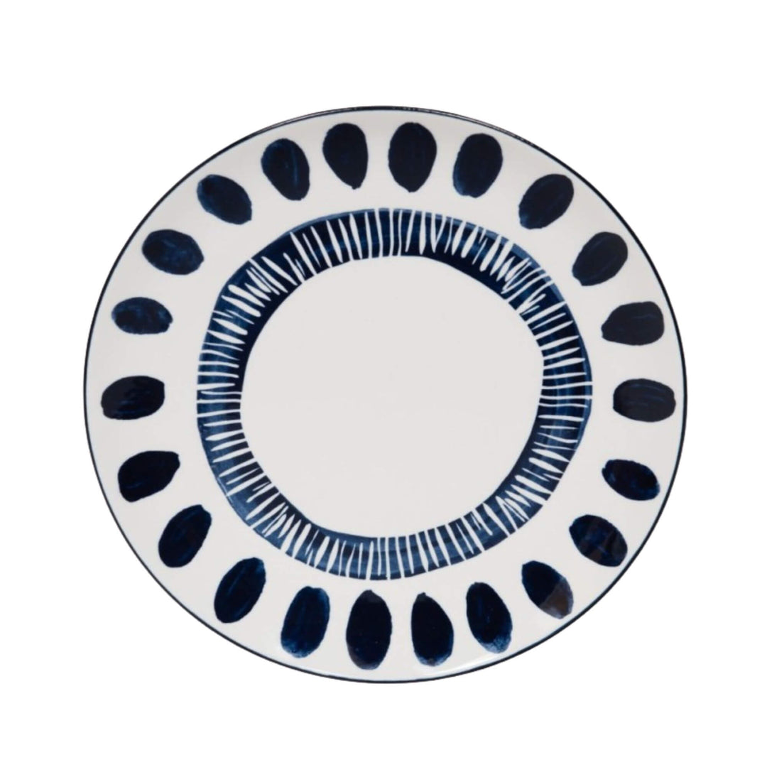 Front view of a Milos dinner plate showcasing circular blue decorative motifs.
