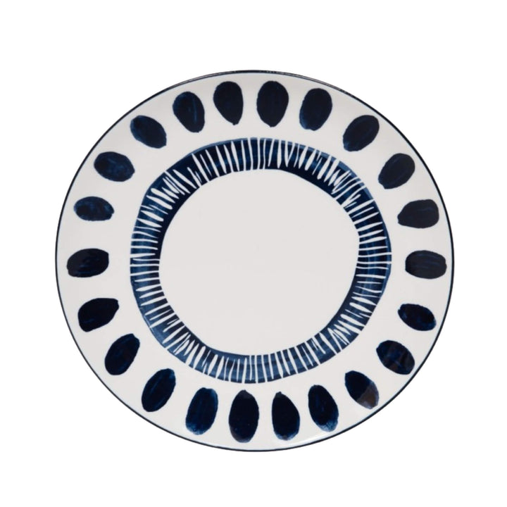 Front view of a Milos dinner plate showcasing circular blue decorative motifs.