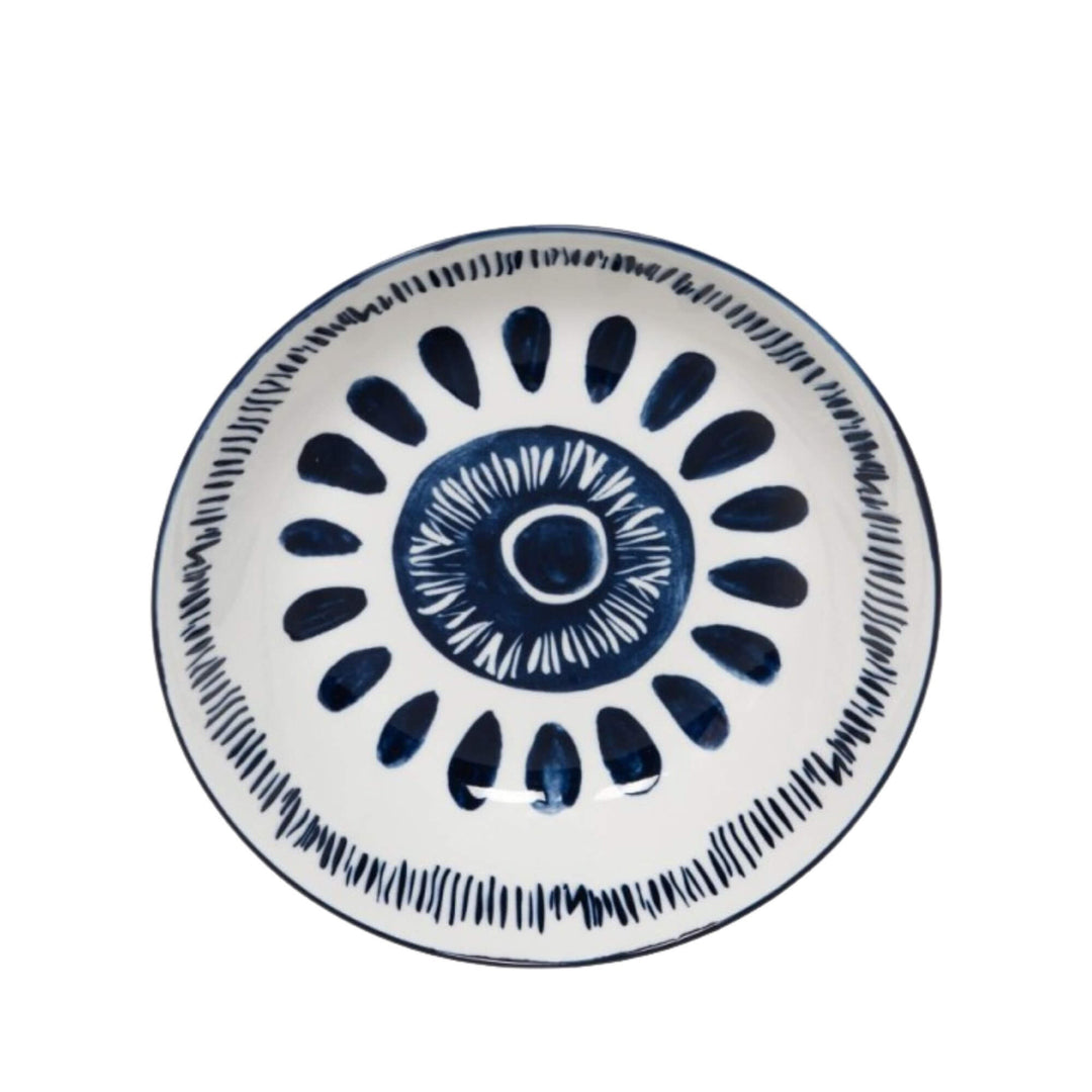 Front view of a Milos soup bowl showcasing circular blue decorative motifs.
