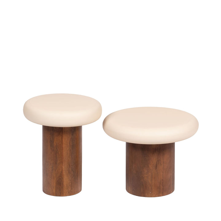 Front view of the Milo side tables showing the two available sizes, rounded cream tops, and cylindrical mango wood bases.