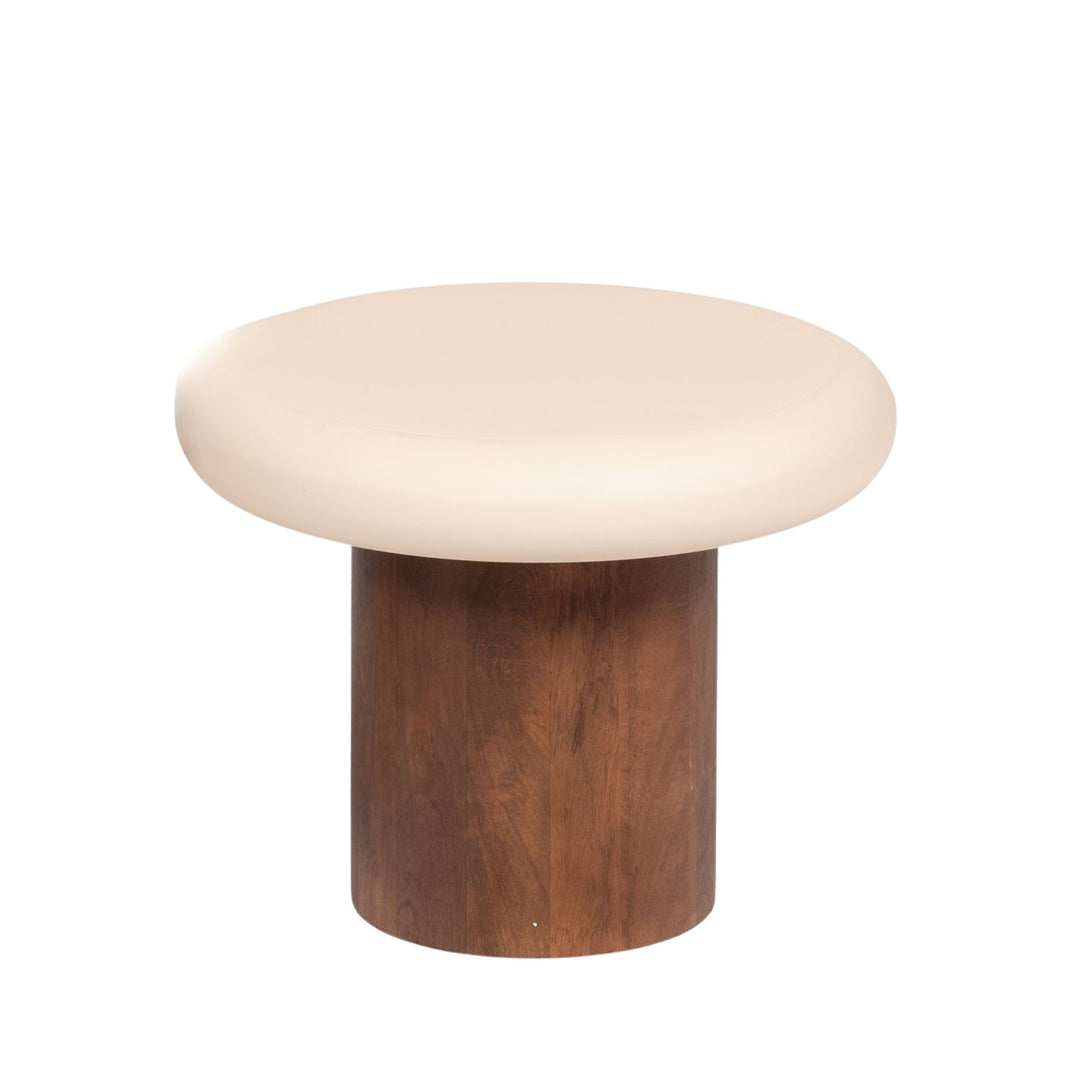 Front view of the low Milo side table showing its wide sculptural top and compact mango wood pedestal base.