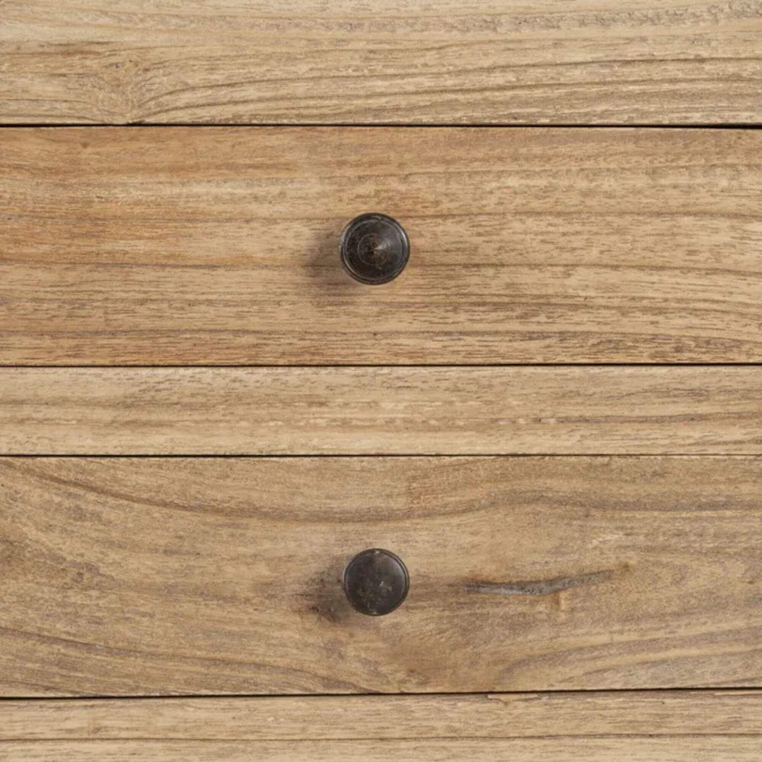 Close-up detail of the open drawer showing the wood interior and handcrafted finish.