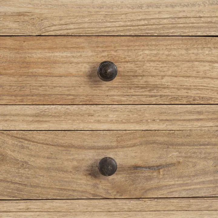 Close-up detail of the open drawer showing the wood interior and handcrafted finish.