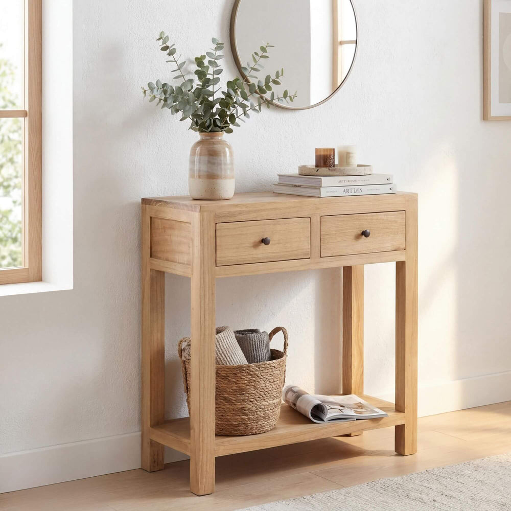 Styled interior setting featuring the mindi console table beneath a mirror in a warm natural space.