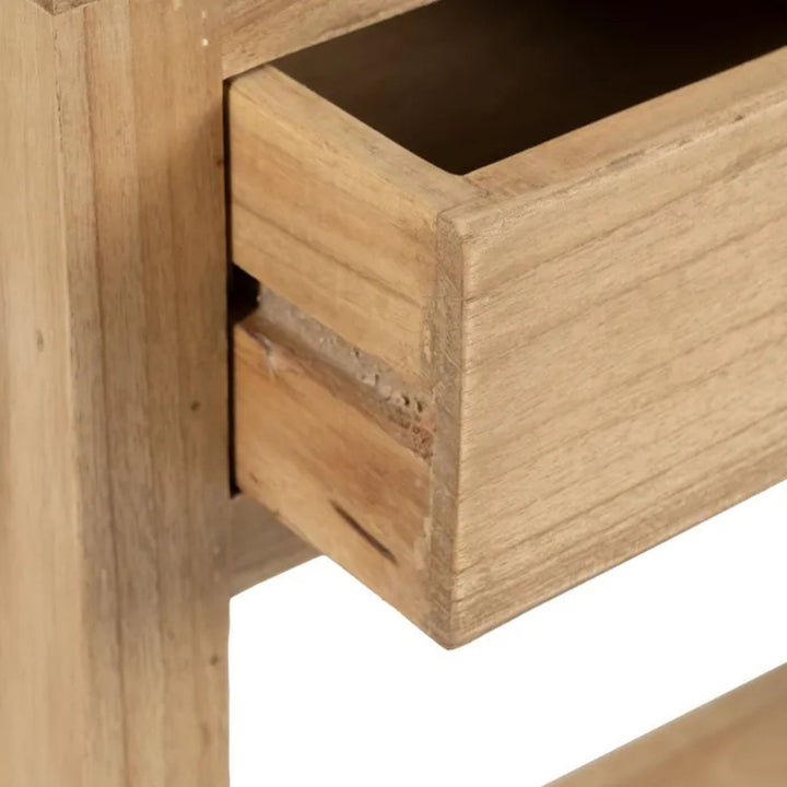 Close-up detail of the open drawer showing the wood interior and practical storage space.