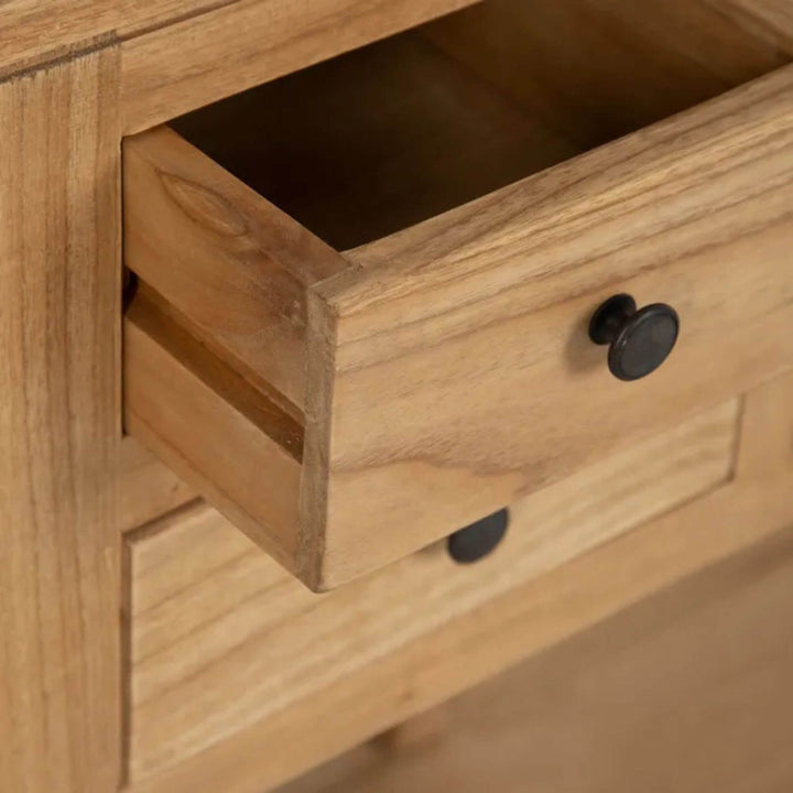 Close-up of drawer detail with round metal knob