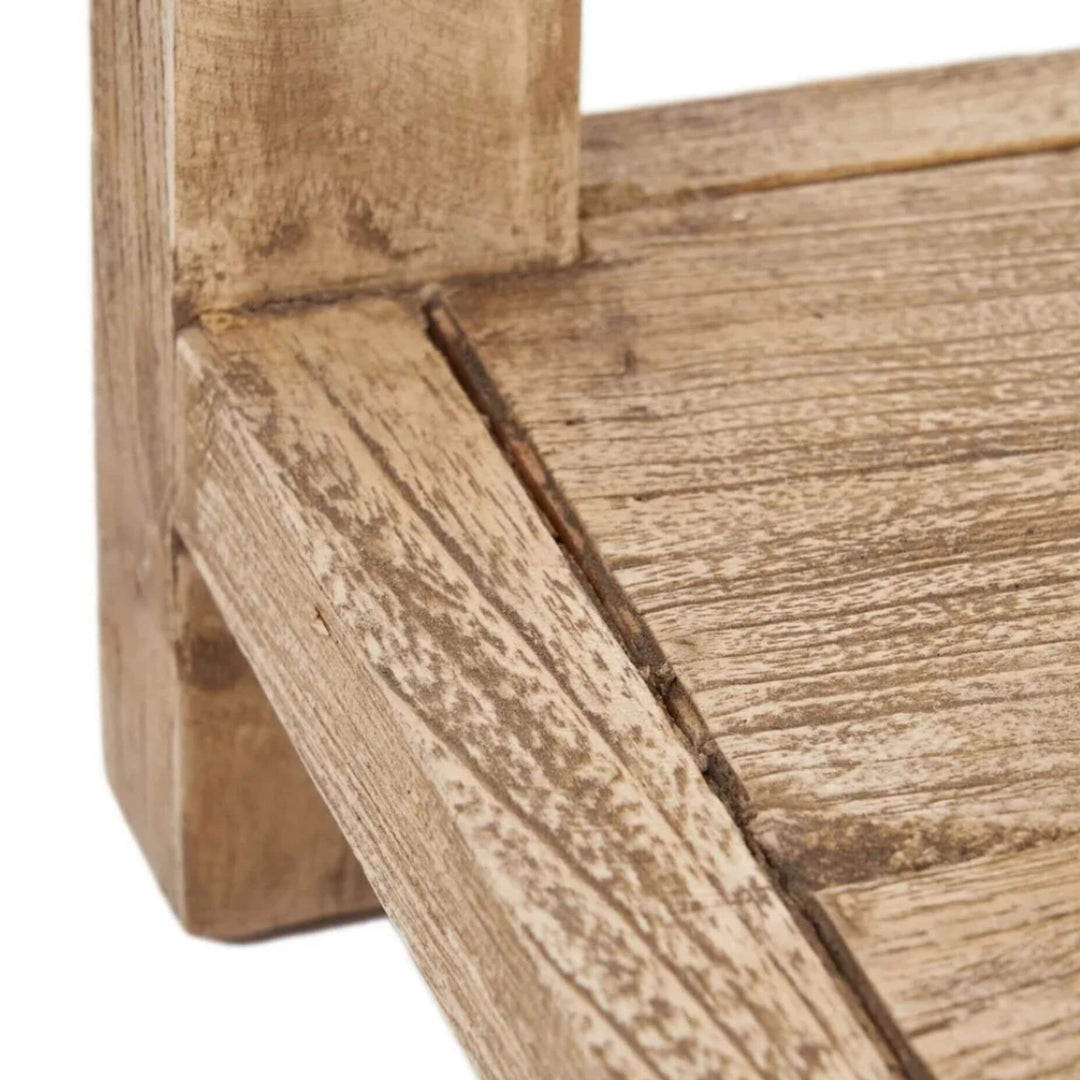 Close-up of the tabletop corner showing the natural mindi wood grain and finish.