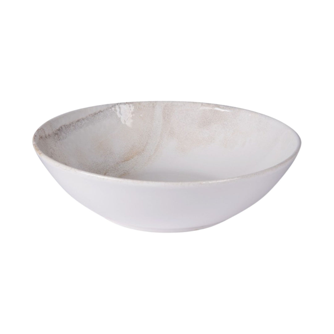 Ceramic saladier from the Mojave tableware collection with soft organic finish.