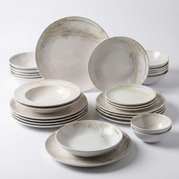 Complete Mojave ceramic tableware set with plates and bowls in neutral tones.