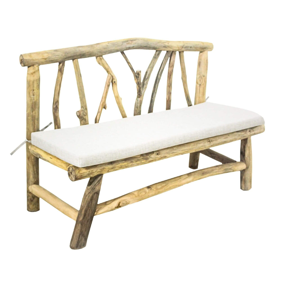 Angled view showing organic teak branch frame and seat cushion