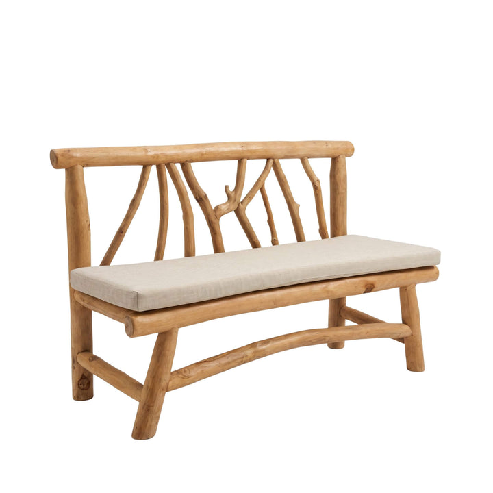 Front angled view of the Molokai teak wood bench with natural branch frame and light seat cushion