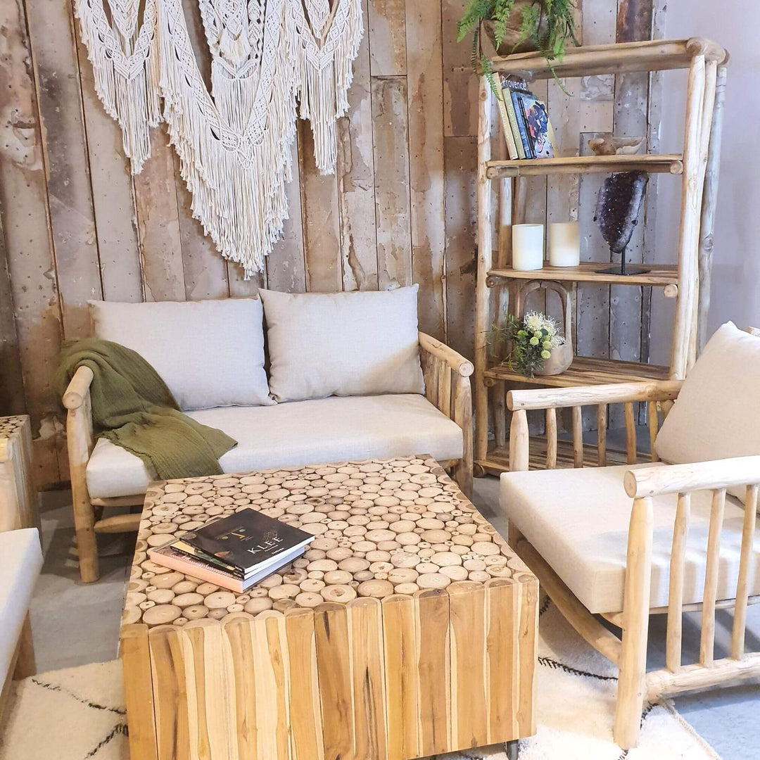 Morioka teak branch bookcase styled in a bohemian living room setting