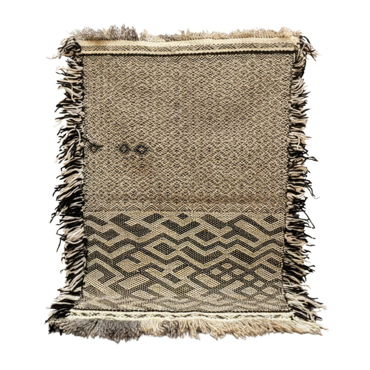 Front view of the Moroccan wool rug with mixed geometric patterns and fringes.