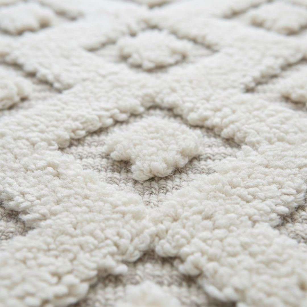 Close-up of the plush wool texture and diamond motif.