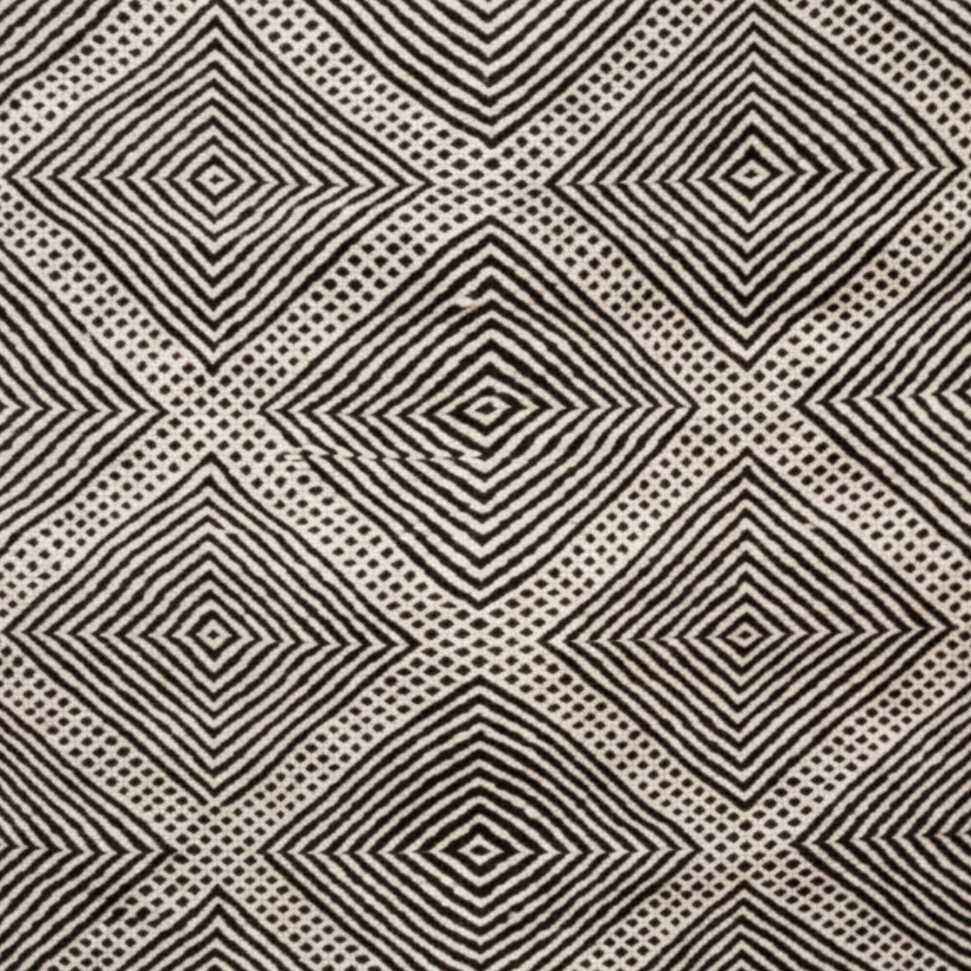 Close-up of the textured handwoven wool pattern of the Moroccan Rug.