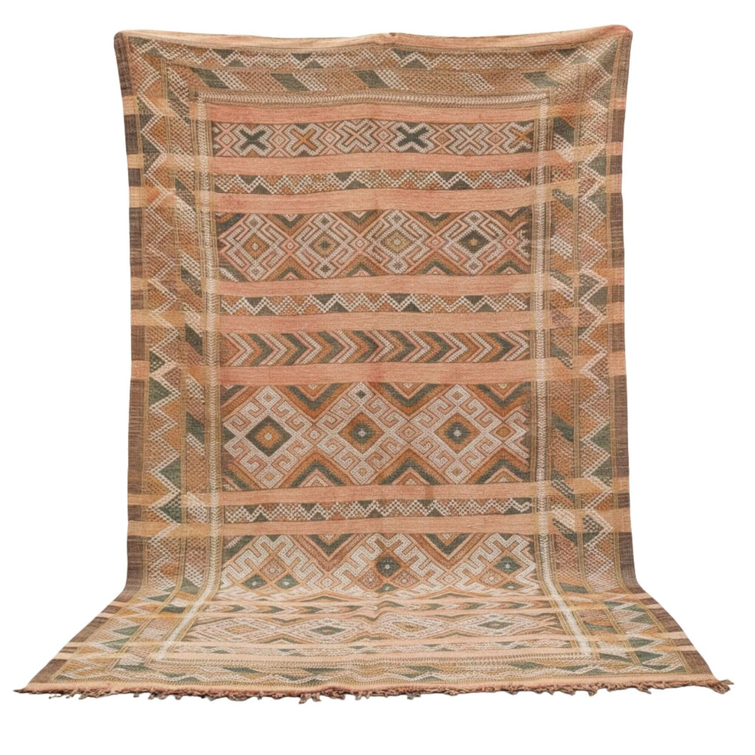 Front view of the Moroccan Rug in terracotta and earthy tones with geometric wool pattern.