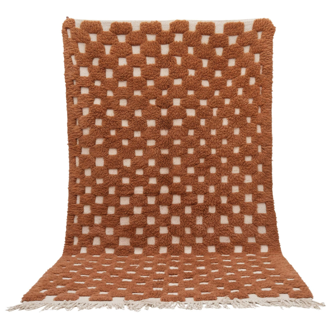 Front view of the Moroccan Rug with terracotta and cream checker pattern.