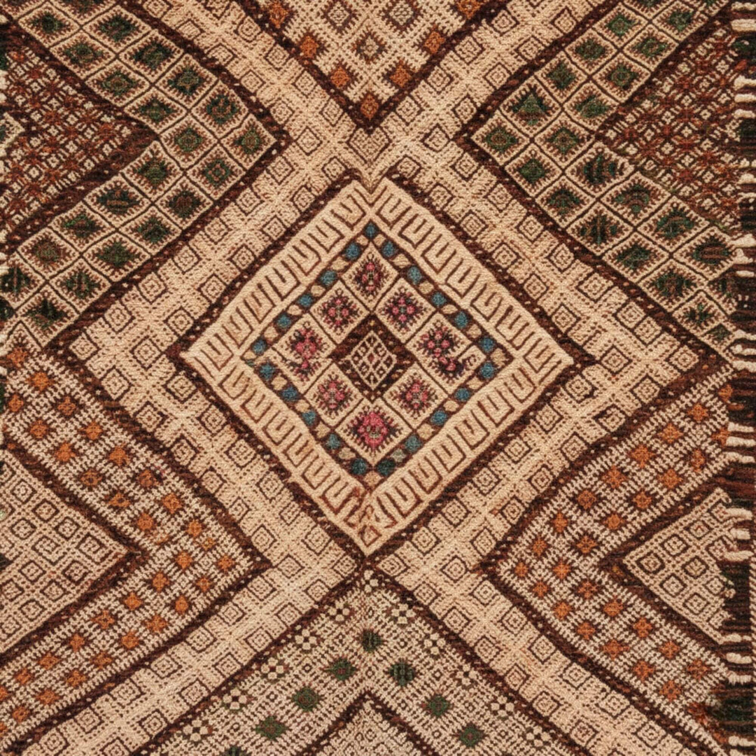 Close-up of the detailed weaving and geometric motifs in earthy tones.