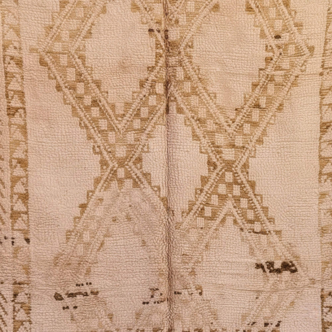 Close-up of the handcrafted Moroccan wool texture and geometric design.