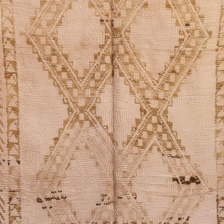 Close-up of the handcrafted Moroccan wool texture and geometric design.